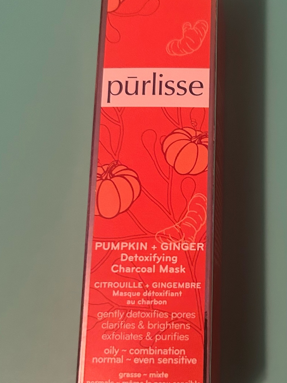 purlisse Pumpkin + Ginger Detoxifying Charcoal Mask - Coral Red Packaging